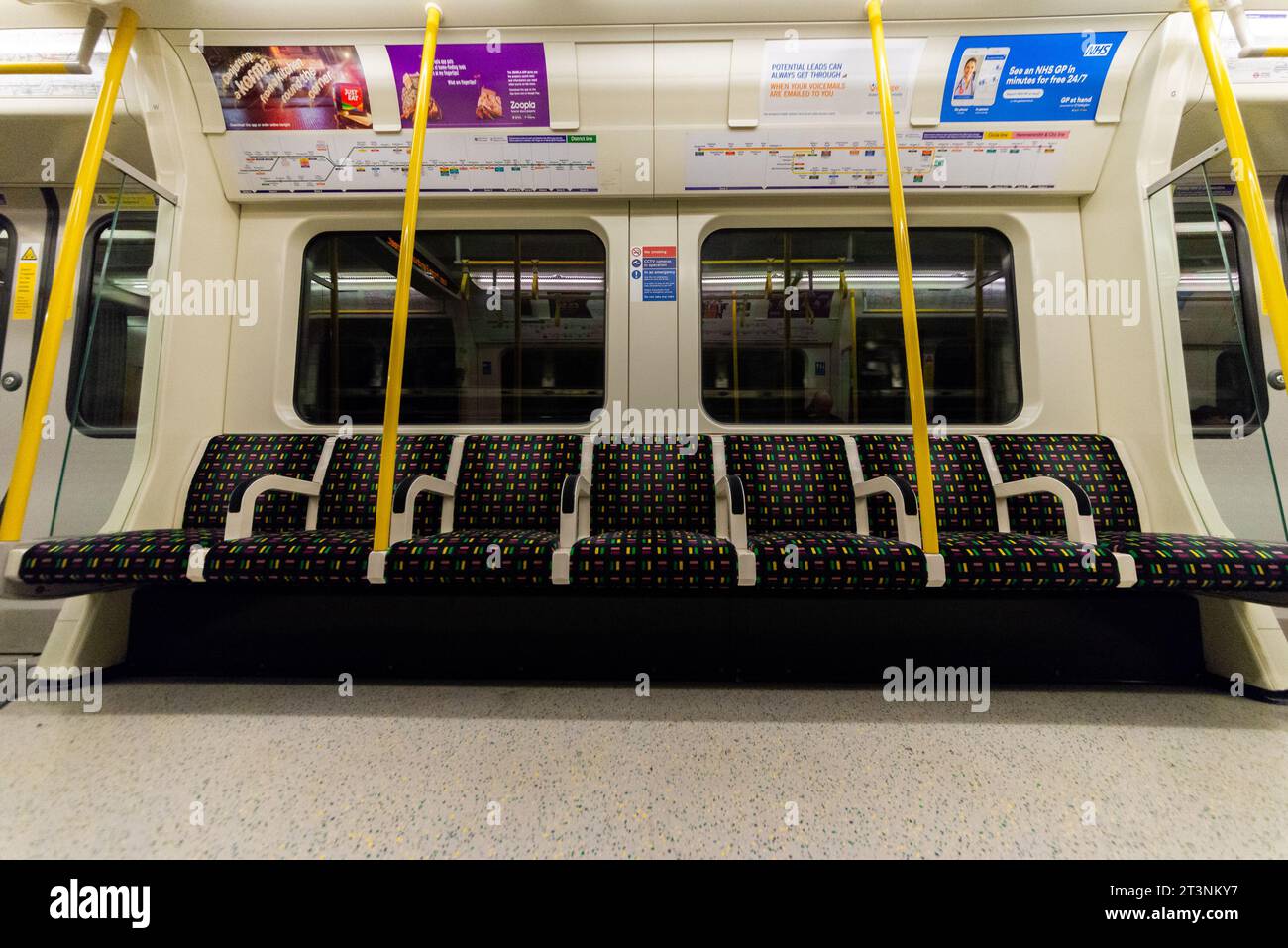 Seats on a London Underground train carriage running on the Circle Line