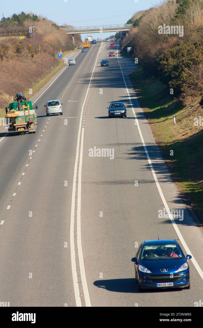 Cars travelling on the A 30 trunk road near Hayle, Cornwall, UK - John Gollop Stock Photo