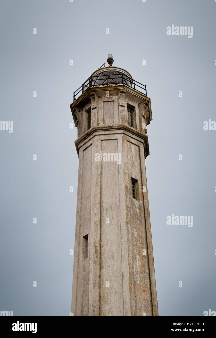 The lighthouse on Alcatraz Island against a gray sky Stock Photo