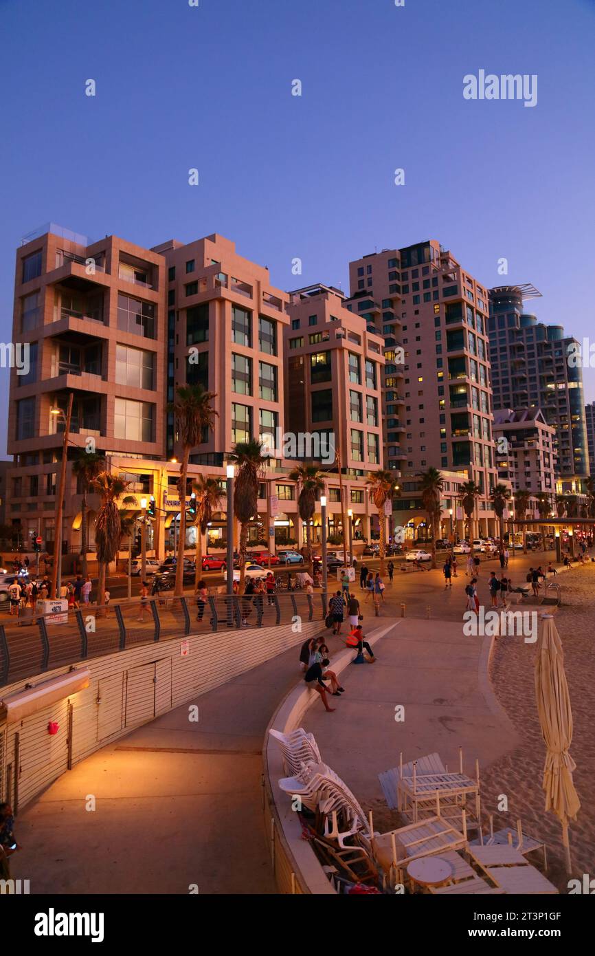 TEL AVIV, ISRAEL - NOVEMBER 3, 2022: People visit beachfront promenade (Tayelet) in Tel Aviv, Israel. Tel Aviv is the economic and technological cente Stock Photo