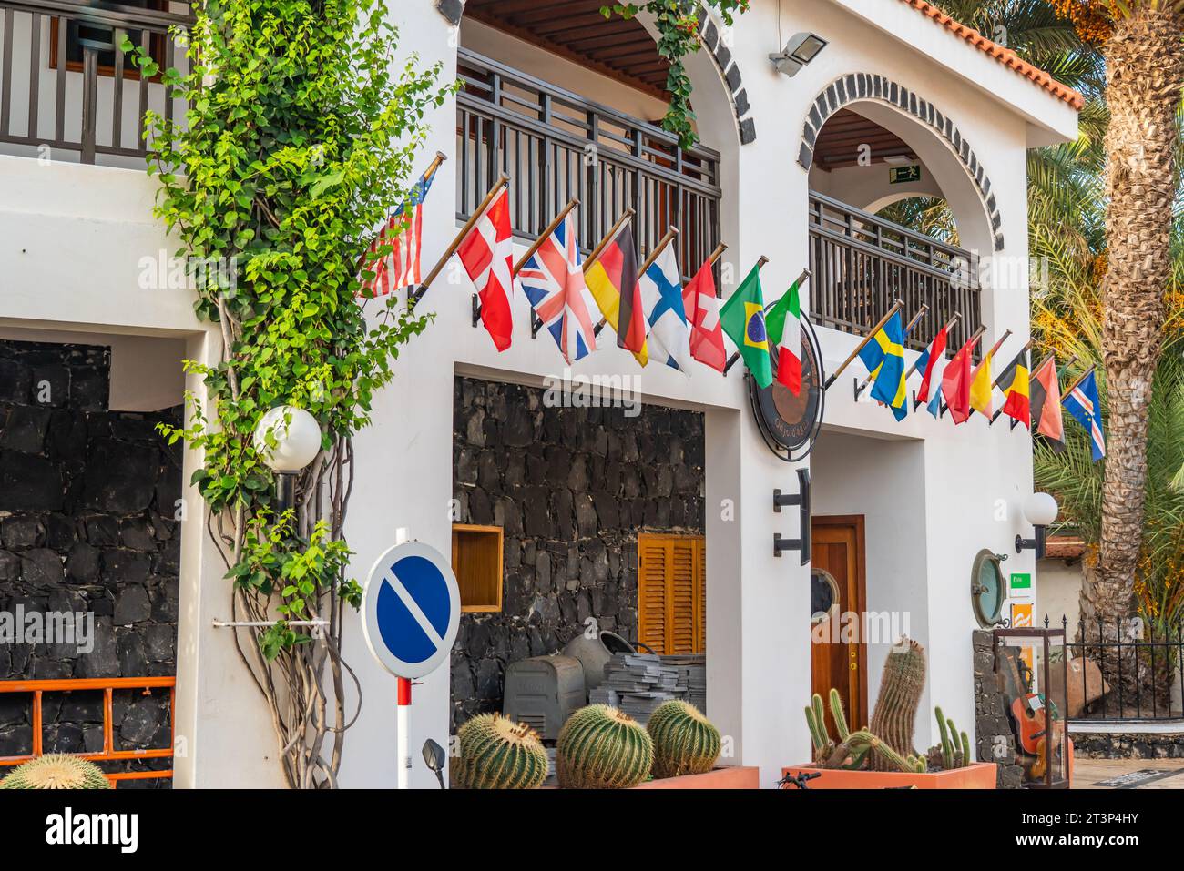 Flags of the Europeans countries in front of a Hotel building in Cape Verde islands Stock Photo