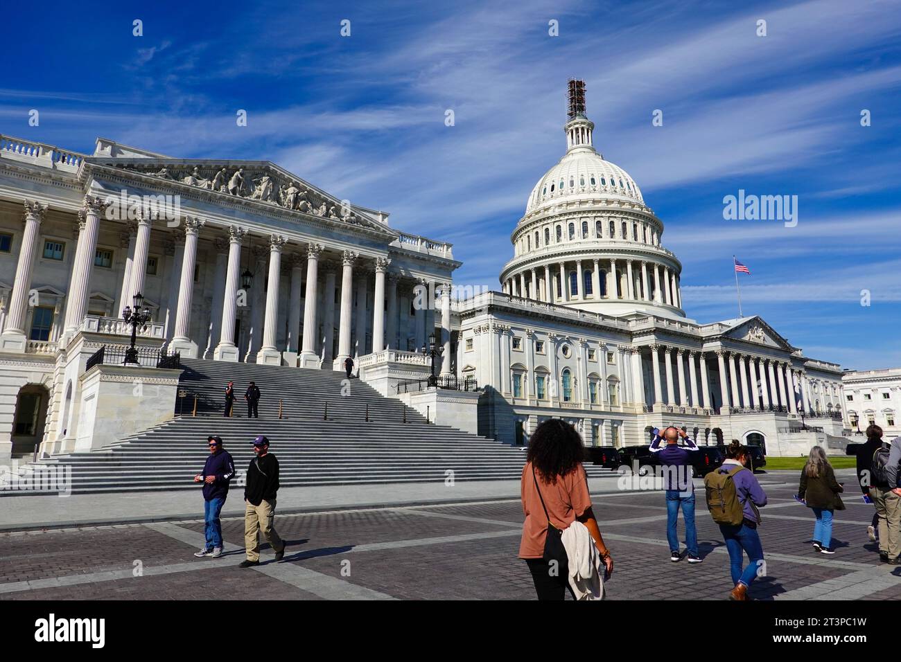 Guests, visitors, people walking in front of the United States Capitol building, East side, Washington, DC, USA. Stock Photo