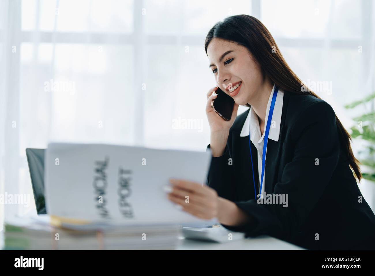 Beautiful young teen asian businesswoman using laptop computer and ...