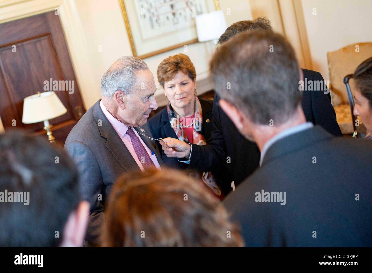 Washington, United States. 26th Oct, 2023. Senate Majority Leader Chuck Schumer, D-NY, is given a dog tag inscribed with 'Bring Them Home- Now' while meeting with family members of hostages held by Hamas at the U.S. Capitol in Washington, DC on Thursday, October 26, 2023. Photo by Bonnie Cash/UPI Credit: UPI/Alamy Live News Stock Photo
