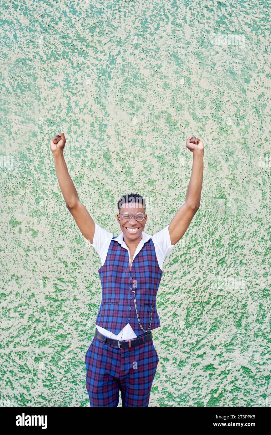 Raises arms in joy hi-res stock photography and images - Alamy