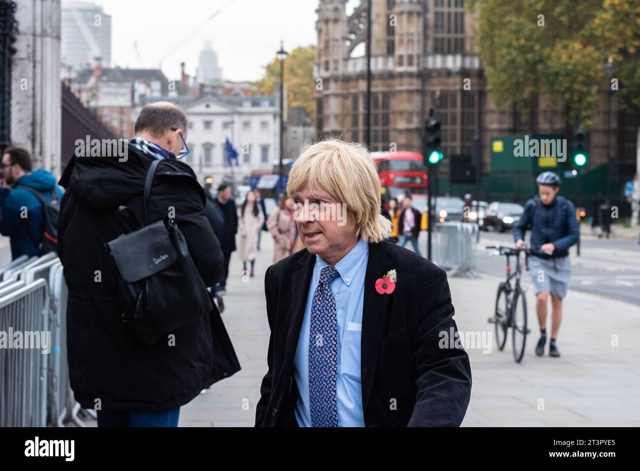 Michael Fabricant MP arriving at House of Commons for their last day of debates before Parliament is dissolved in preparation for the general election Stock Photo