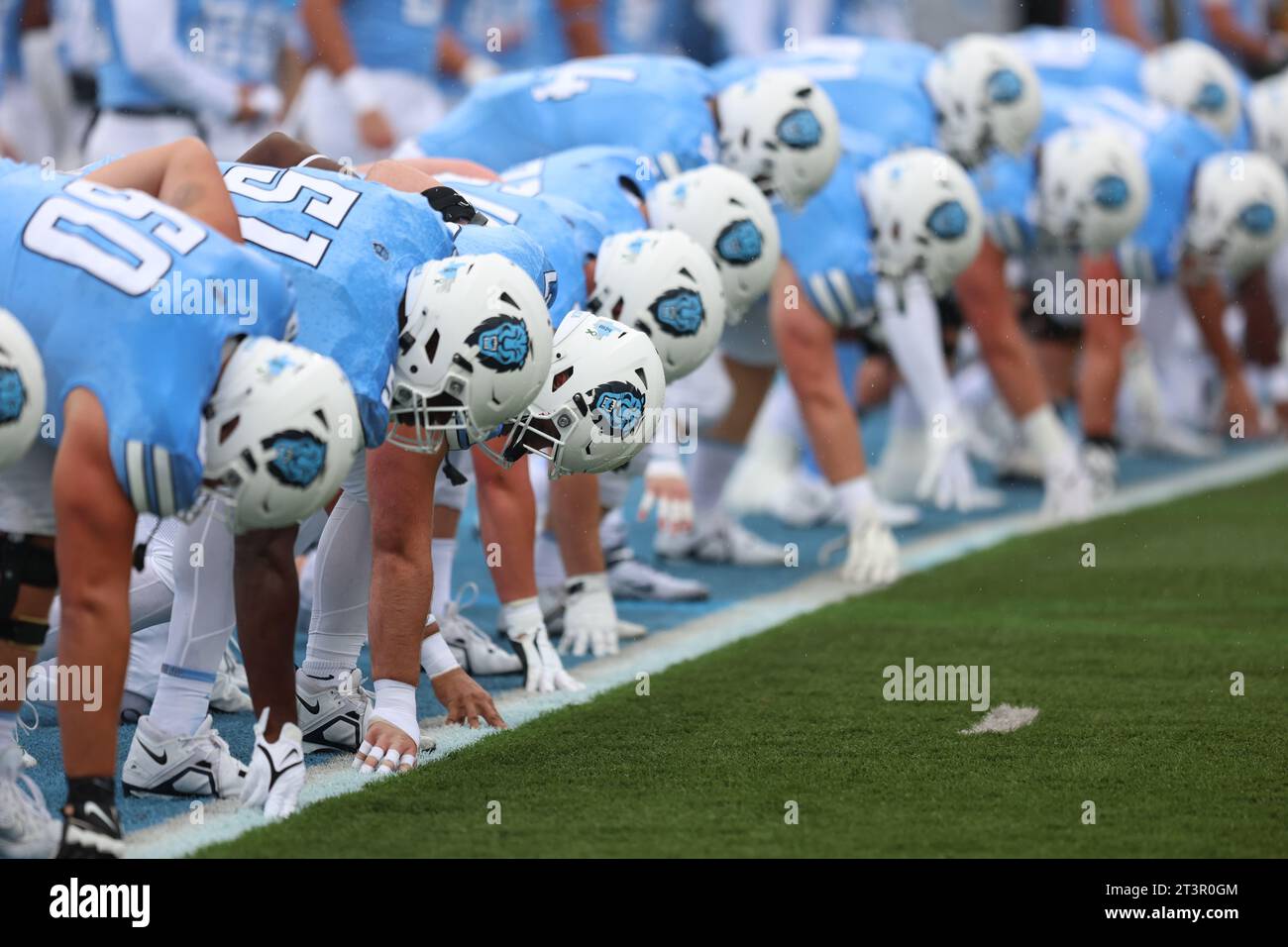 Columbia Lions players stretch before the NCAA football game against the Penn Quakers at Robert K. Kraft Field at Lawrence A. Wien Stadium in New York, New York, Saturday, Oct. 14, 2023. (Photo: Gordon Donovan) Stock Photo
