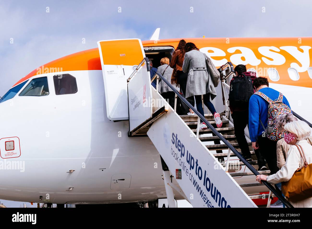 Passengers boarding an EasyJet plane. Liverpool, Merseyside, Lancashire, England, United Kingdom, Europe. Stock Photo