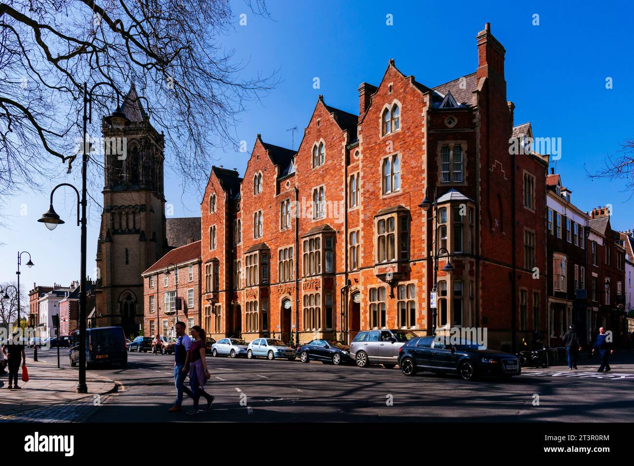 Dean Court Hotel and tower of York Oratory. Duncombe Place, York, North Yorkshire, Yorkshire and the Humber, England, United Kingdom, Europe Stock Photo