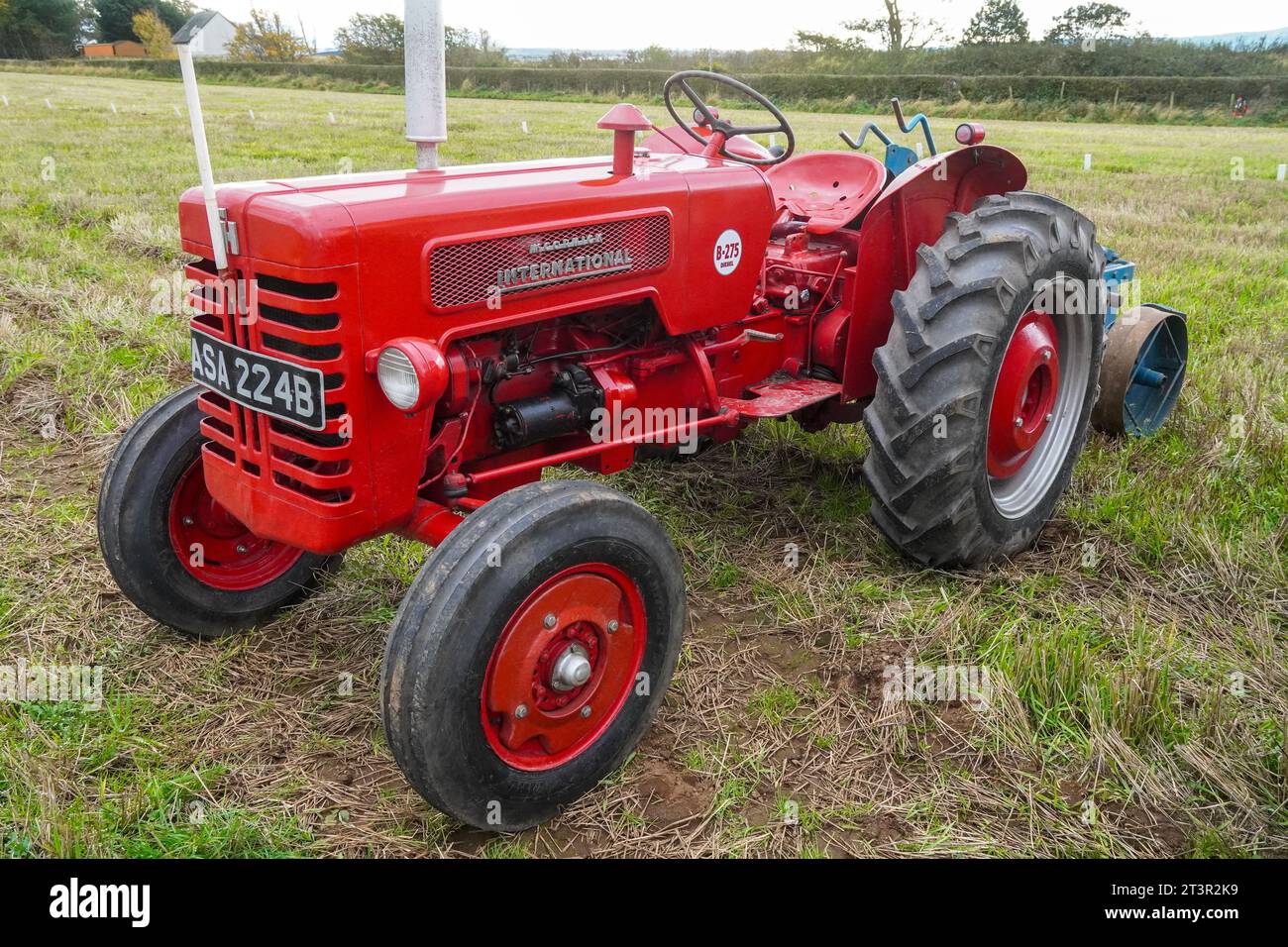 Red coloured 1964 McCormick International B 275 tractor on display at an agricultural show, Troon, Ayrshire, Scotland, UK Stock Photo