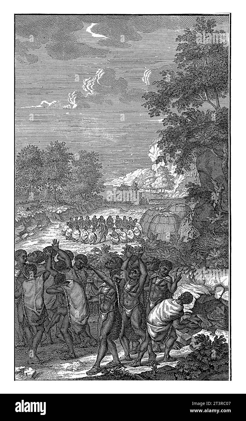 Ceremony after the burial of a Khoi, Jan Caspar Philips, 1727 Landscape with a Khoi being buried in a burrow, which is covered with leaves. The mourne Stock Photo