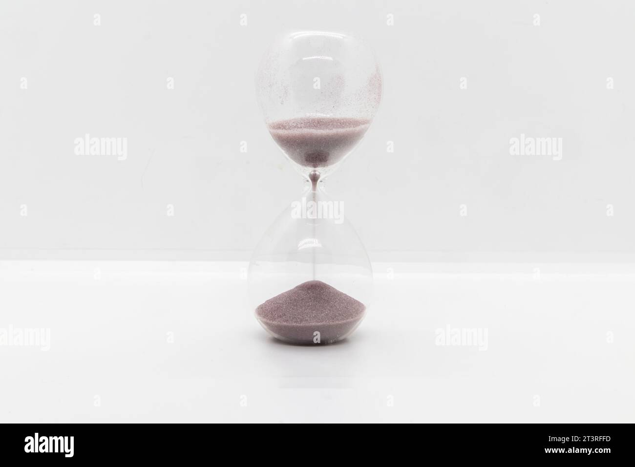 Hourglass isolated on white Stock Photo