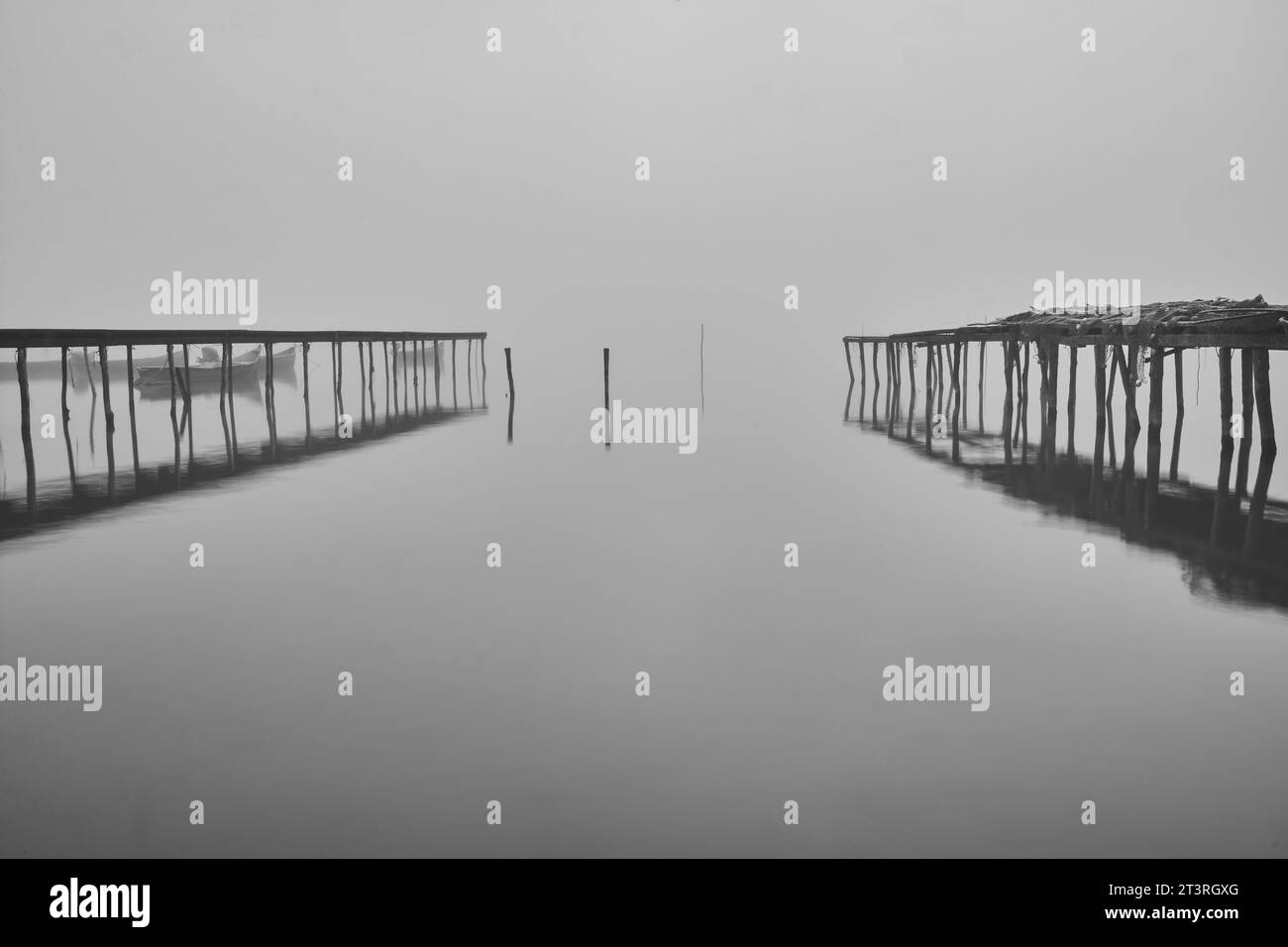 Person on boats Black and White Stock Photos & Images - Alamy