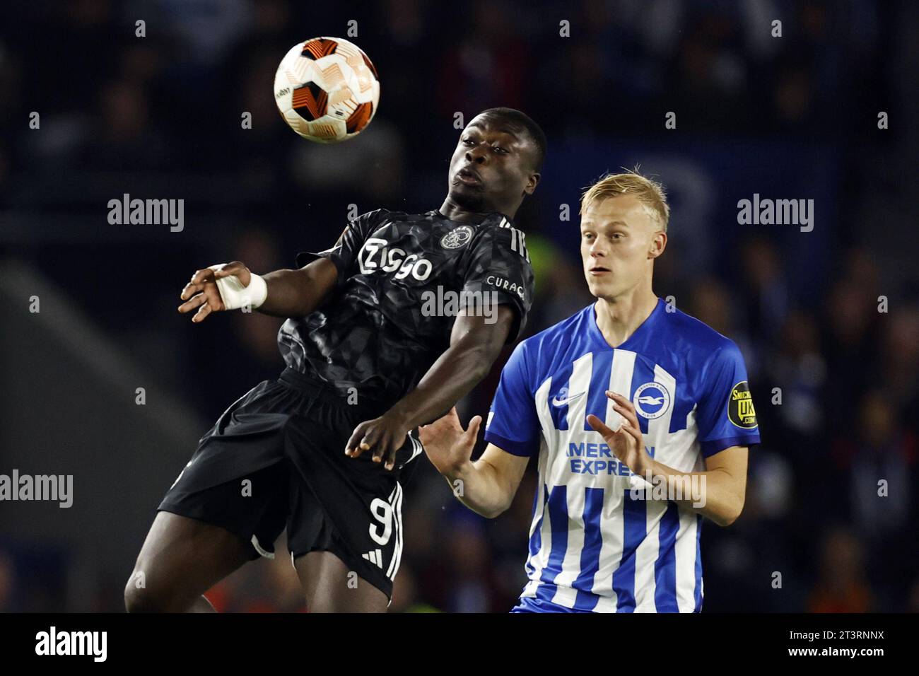 BRIGHTON (lr) Brian Brobbey of Ajax, JanPaul van Hecke of Brighton Hove Albion during the BRIGHTON (lr) Brian Brobbey of Ajax, JanPaul van Hecke of Brighton Hove Albion during the