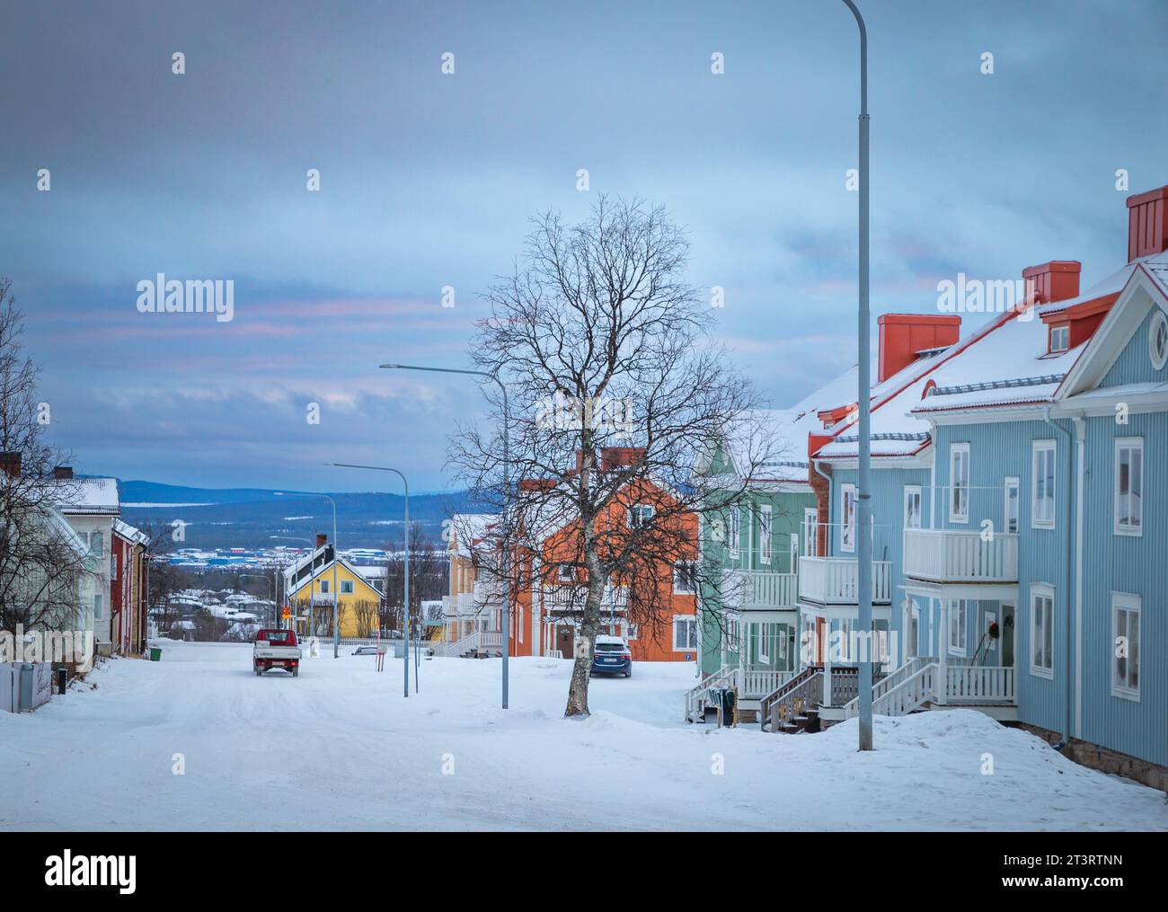 Scenic Fairytale Town Street Covered By Snow With Colorful Traditional scenic-fairytale-town-street-covered-by-snow-with-colorful-traditional