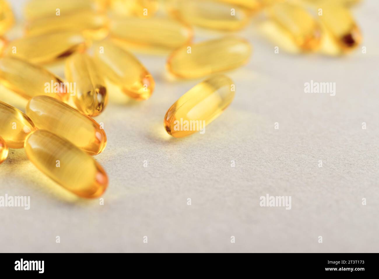 Cod liver oil capsules on light background closeup Stock Photo