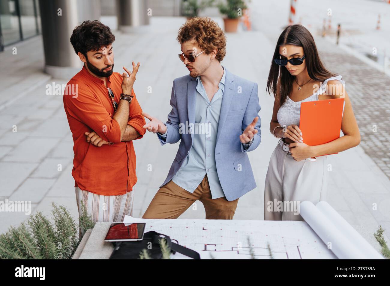 Corporate Development: Architects and Engineers Discussing Sustainable Design and Profitable Project Planning Stock Photo