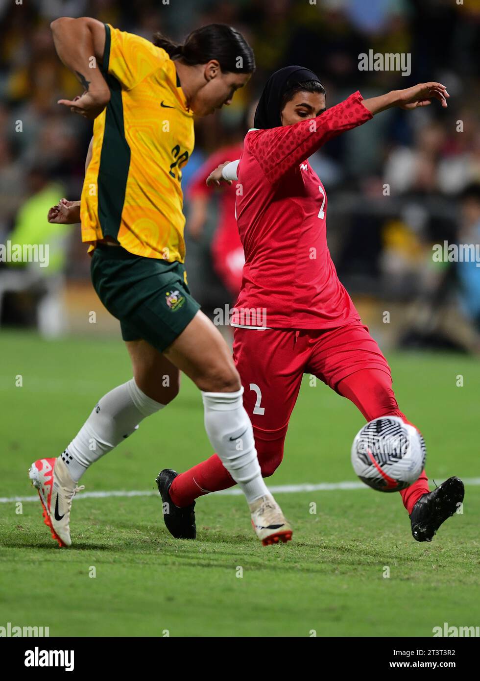 Perth, Australia. 26th Oct, 2023. Samantha May Kerr (L) of the Australia women's football team and Fatemeh Amineh Borazjani (R) of the Islamic Republic of Iran women's football team are seen in action during the 2024 AFC Women's football Olympic Qualifying Round 2 Group A match between Australia and Islamic Republic of Iran held at the Perth Rectangular Stadium. Final score Australia 2:0 Islamic Republic of Iran. Credit: SOPA Images Limited/Alamy Live News Stock Photo