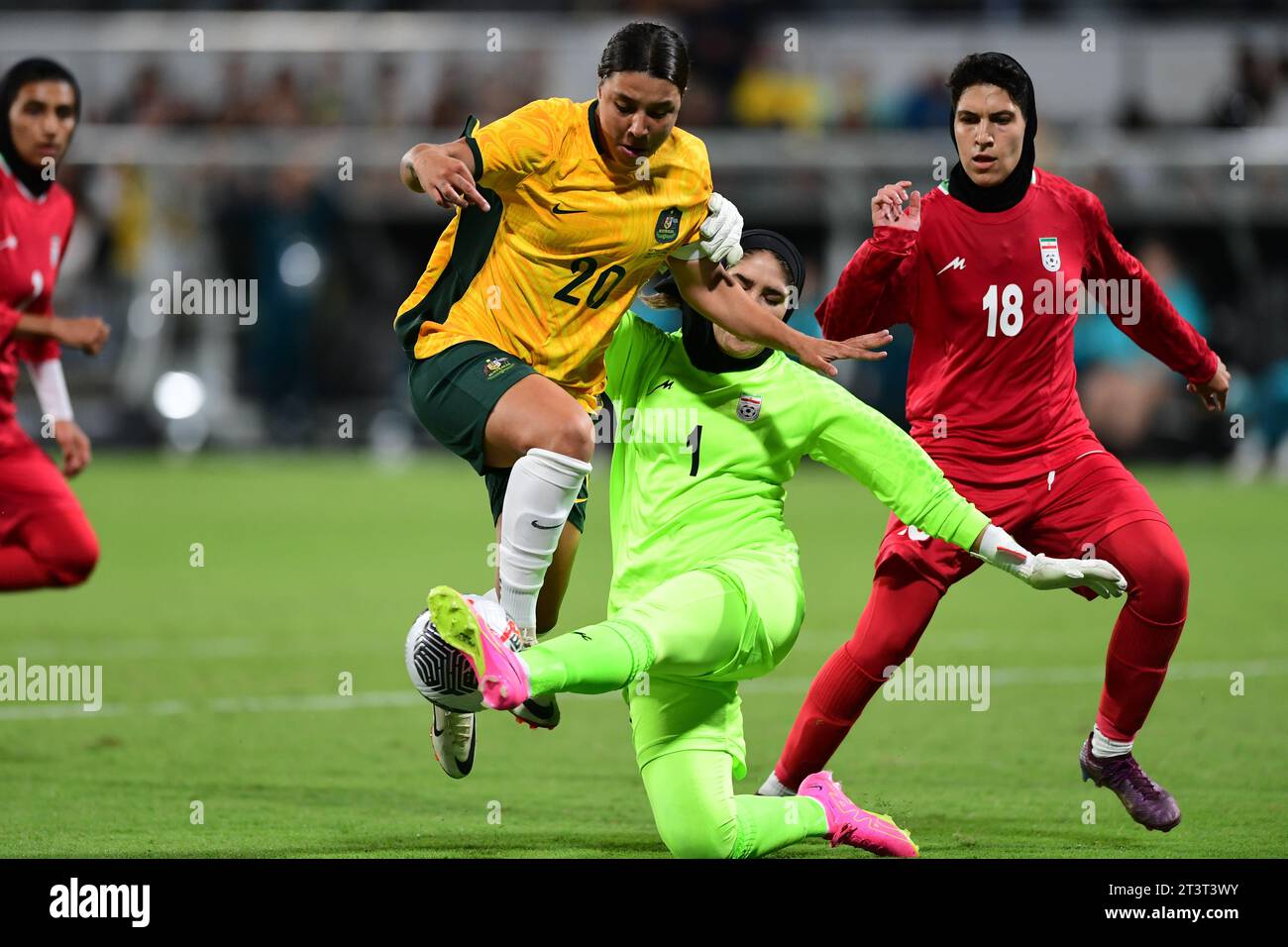 Perth, Australia. 26th Oct, 2023. Samantha May Kerr (L) of the Australia women's football team and Zahra Khajavi (M), Melika Mohammadi (R) of the Islamic Republic of Iran women's football team are seen in action during the 2024 AFC Women's football Olympic Qualifying Round 2 Group A match between Australia and Islamic Republic of Iran held at the Perth Rectangular Stadium. Final score Australia 2:0 Islamic Republic of Iran. Credit: SOPA Images Limited/Alamy Live News Stock Photo