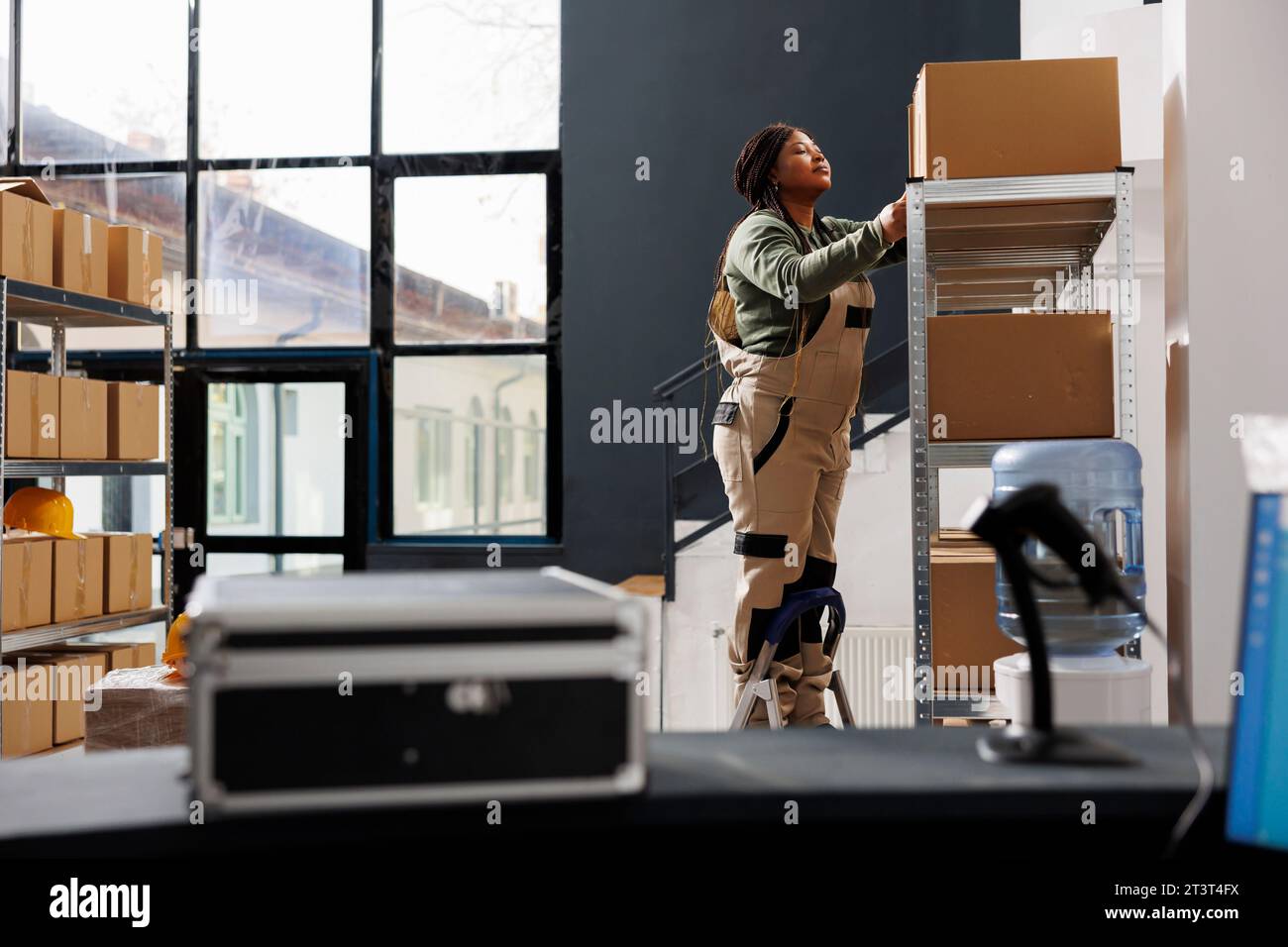 Factory stockroom boxes on shelf hi-res stock photography and images