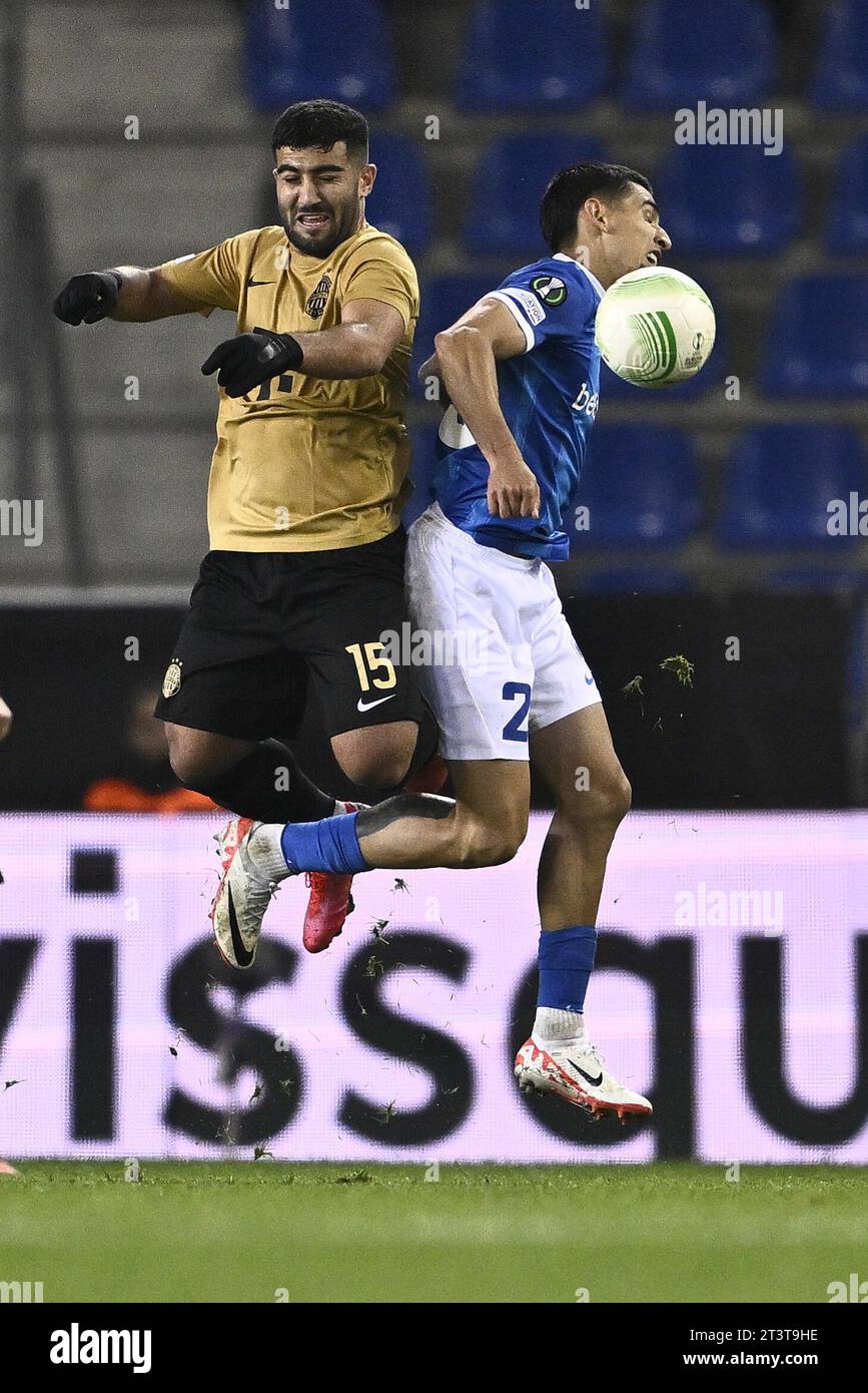 BUDAPEST, HUNGARY - AUGUST 13: (l-r) Tokmac Chol Nguen of Ferencvarosi TC  wins the ball from Arijan Ademi of GNK Dinamo Zagreb during the UEFA  Champions League Third Qualifying Round match between