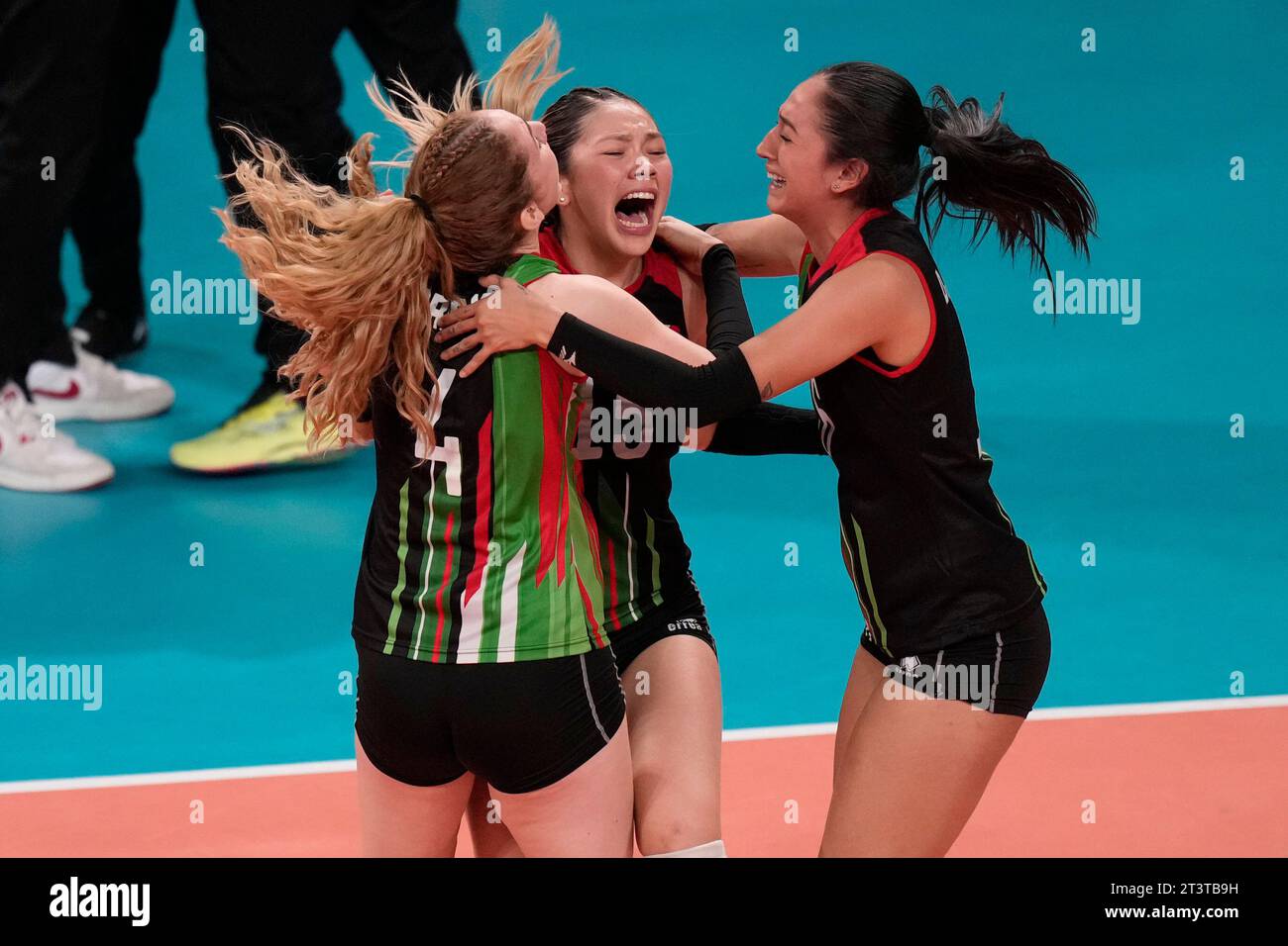Mexico's players celebrate after defeating Argentina in the women's ...