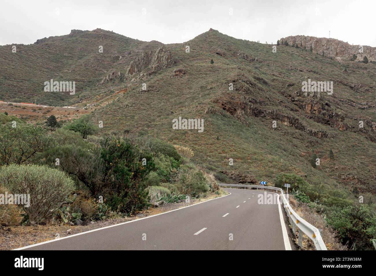 Road going up mountains Stock Photo