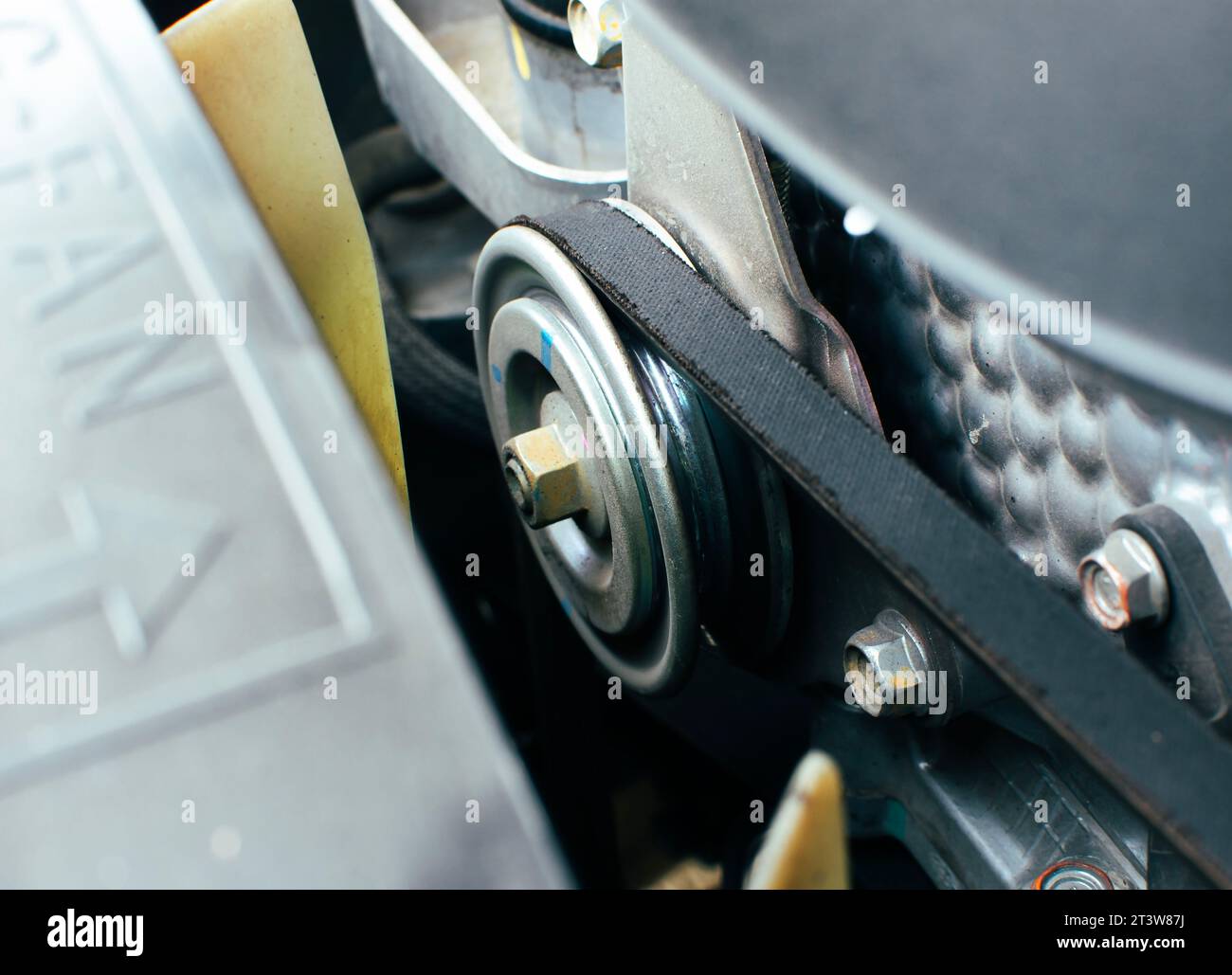 Timing belt and tensioner pulley of car engine Automotive part concept