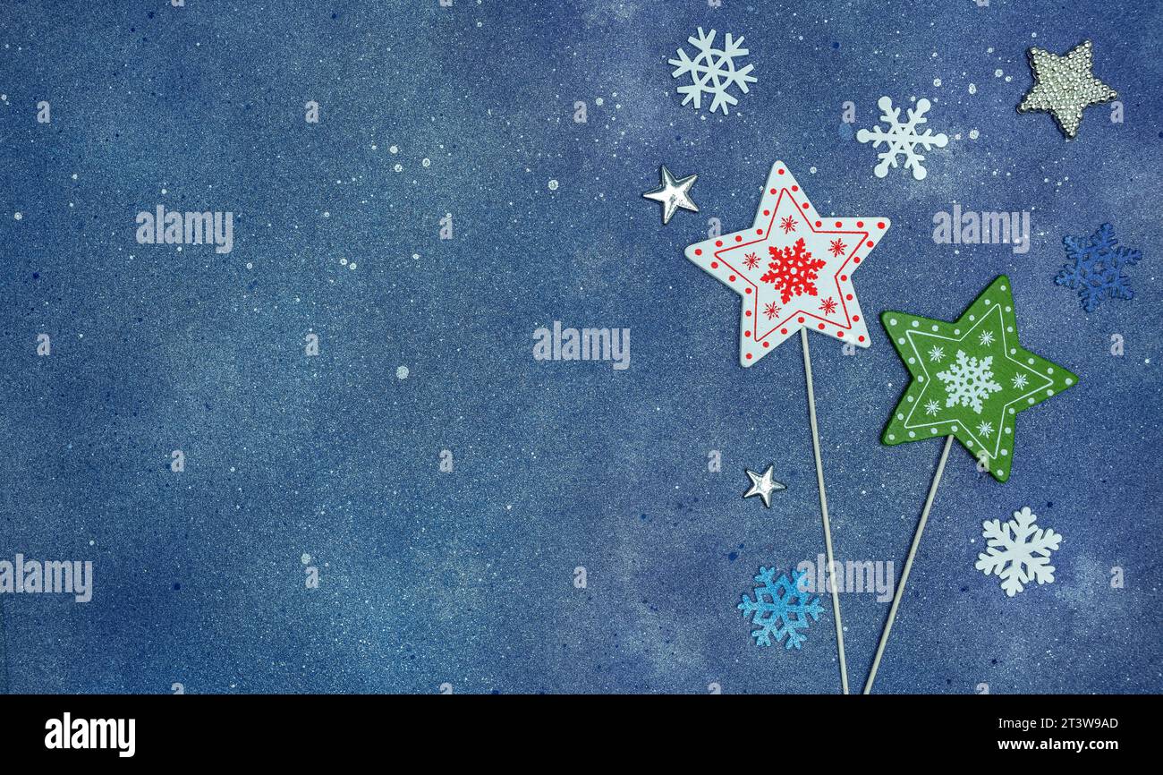 Blue background with snowflakes and stars hi-res stock photography and ...