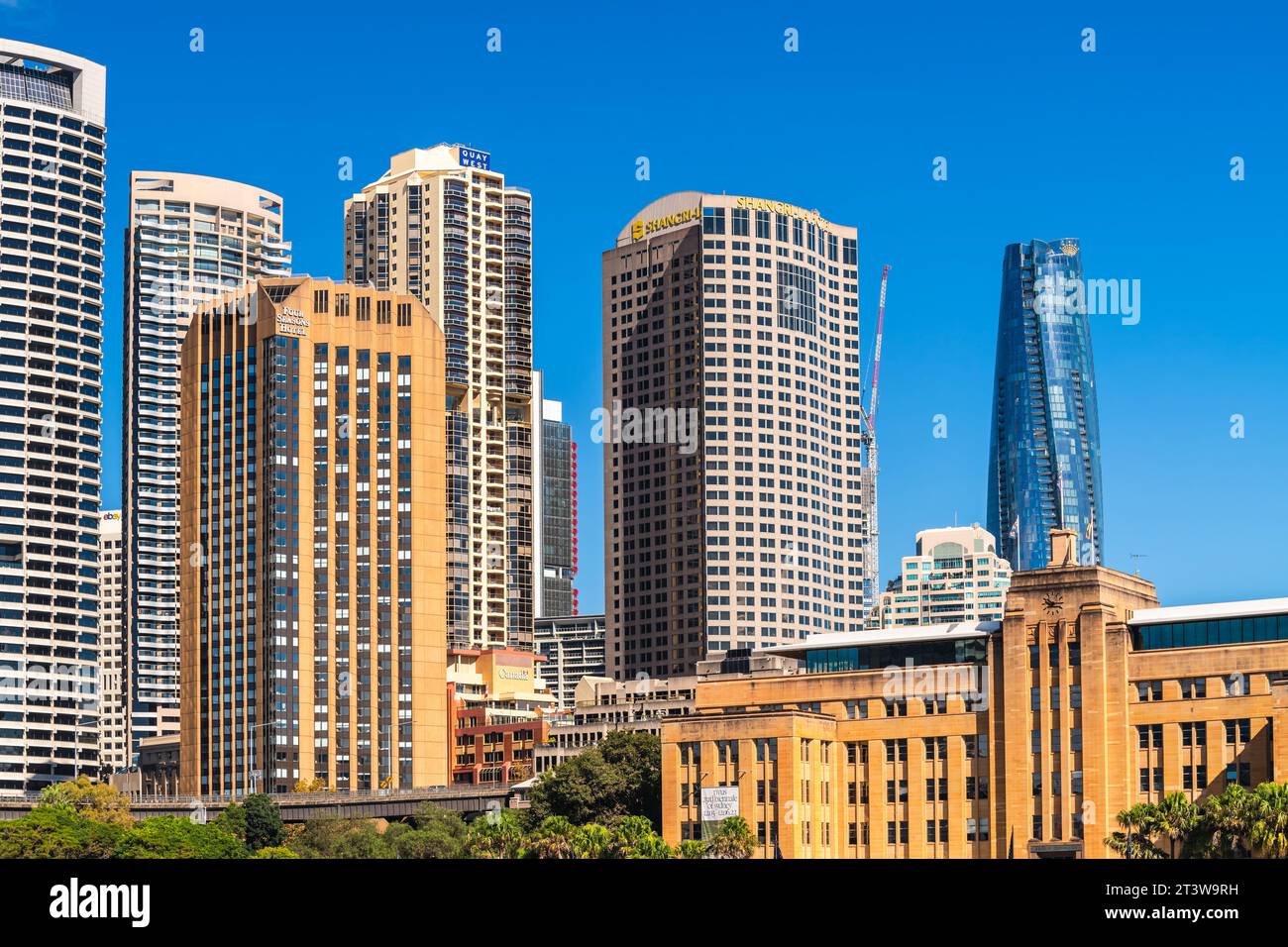 Sydney, Australia - April 17, 2022: Sydney city central business district skyline viewed from a ferry towards the Circular Quay on a sunny day Stock Photo