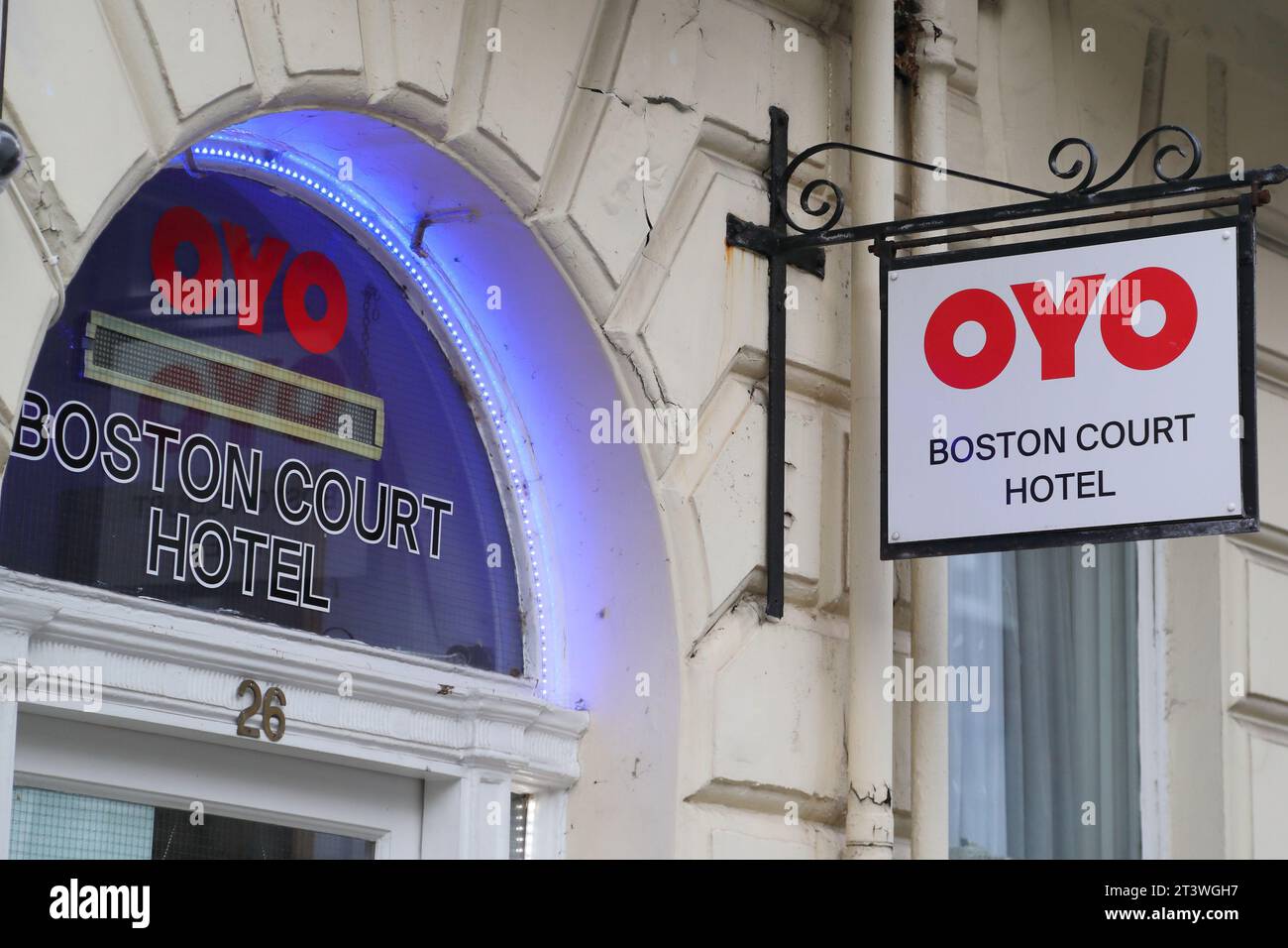 Sign above the entrance to the OYO Boston Court hotel in London UK Sign above the entrance to the OYO Boston Court hotel in London UK