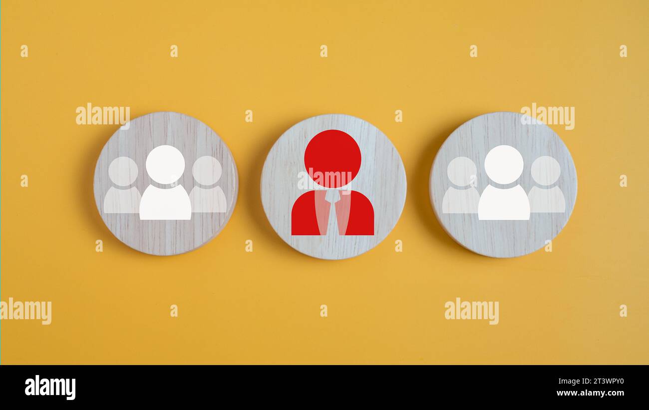 Circle board with employee icons on a yellow background shows the concept of human resource management and teamwork and coordination. Stock Photo