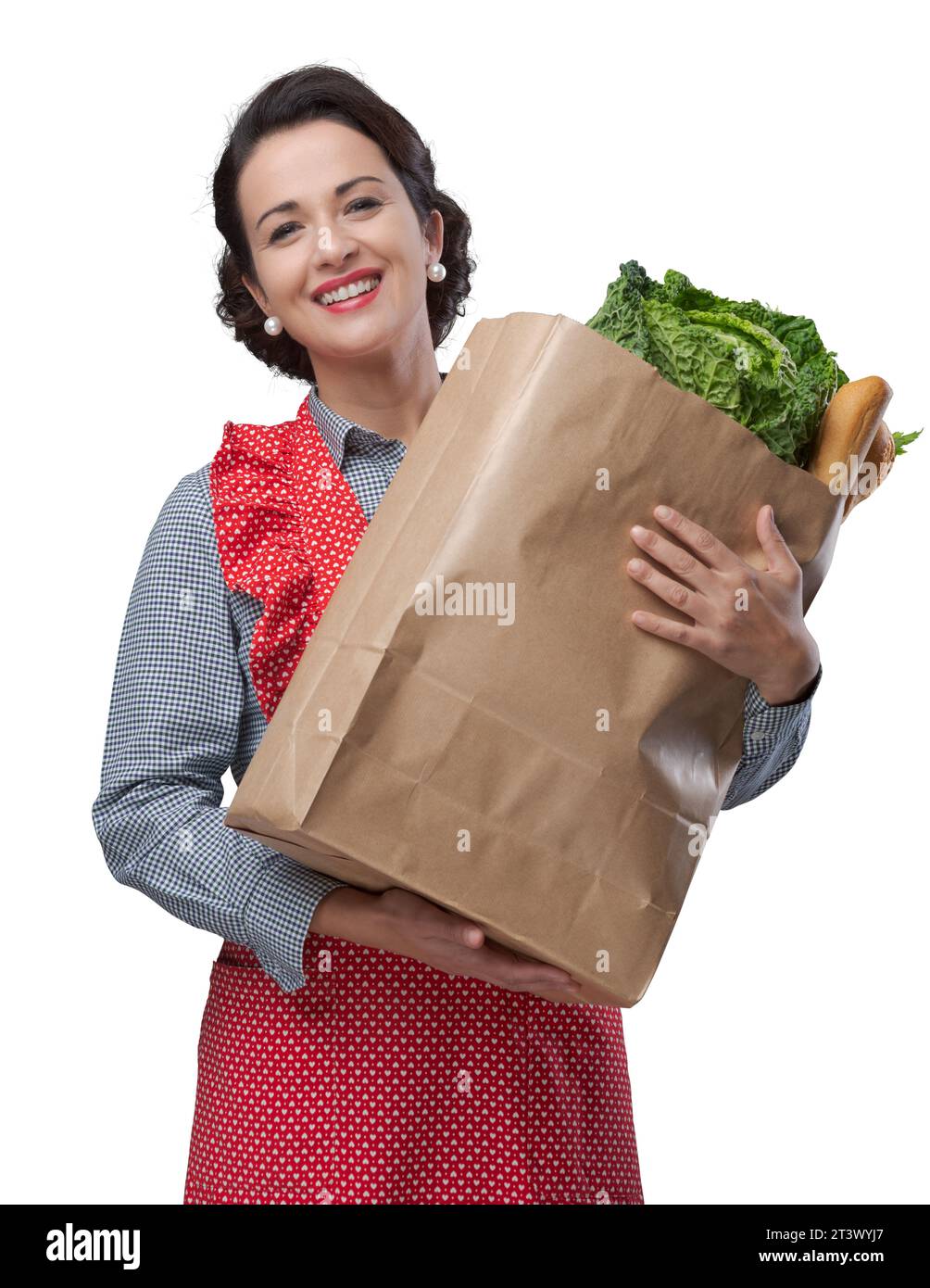 Smiling vintage woman in apron holding a shopping grocery bag Stock ...