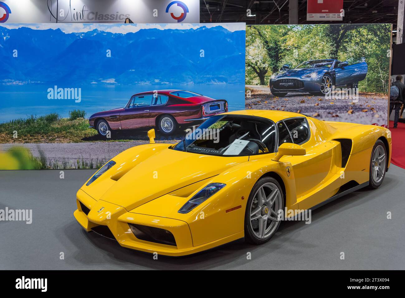 Paris, France - Rétromobile 2020. Focus on a 2003 Giallo Modena Ferrari Enzo. Stock Photo