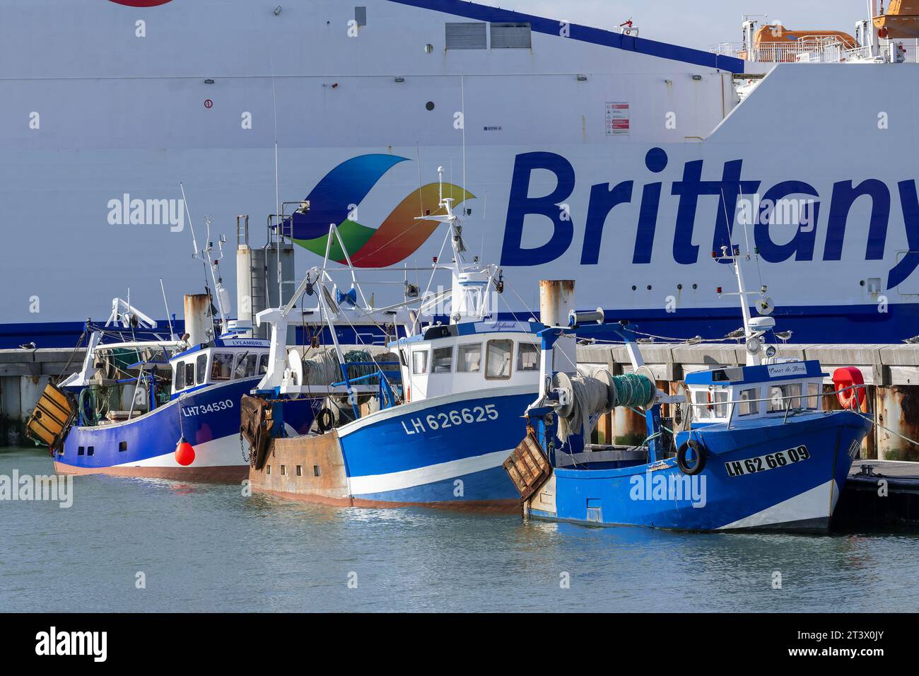 Le Havre, France - Line up of fishing vessels alongside at fishing port of Le Havre. Stock Photo