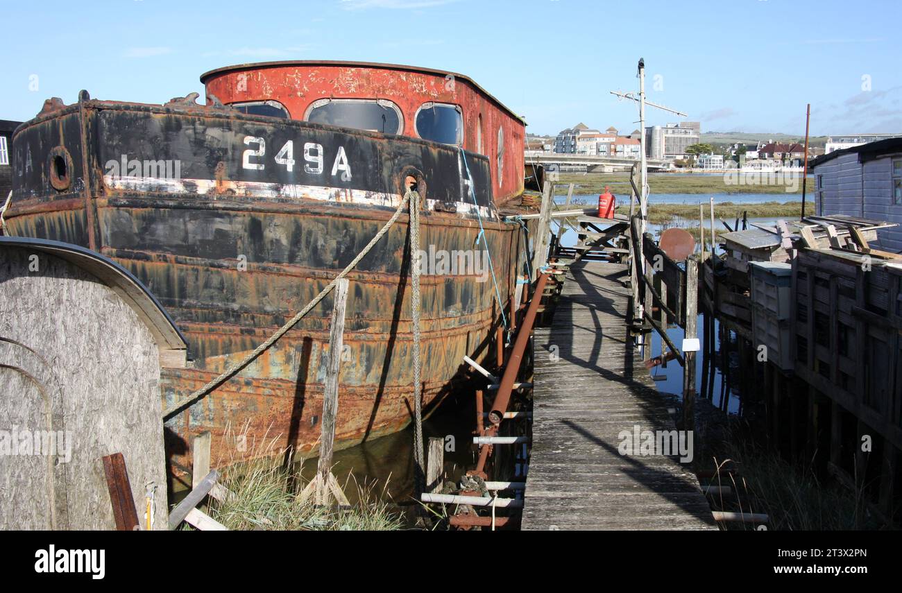 A view looking across from the house boats to the road bridge at Shoreham Stock Photo