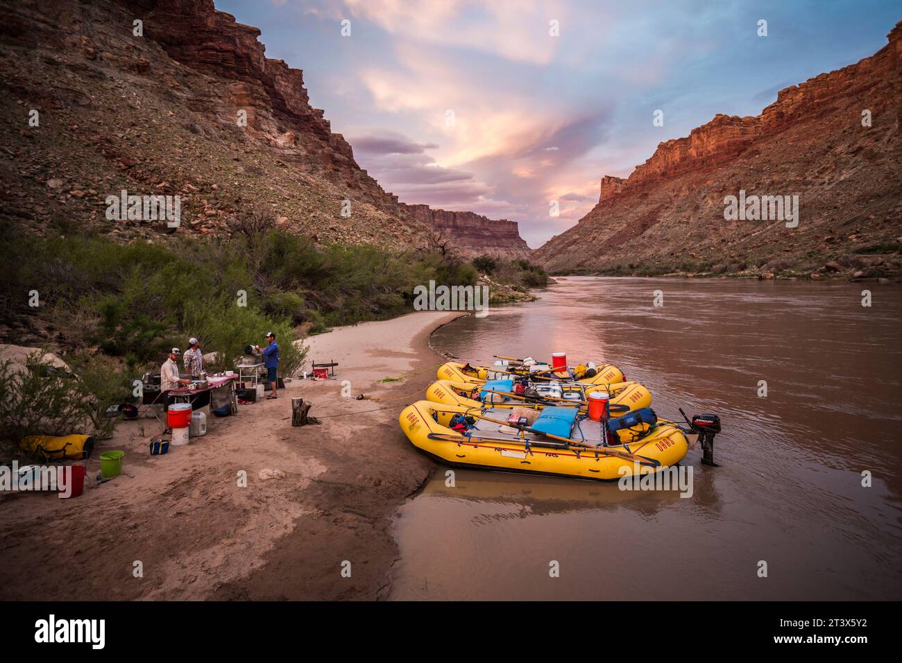 Kansas Rafts Camp and rafts along a river at sunset Stock Photo - Alamy