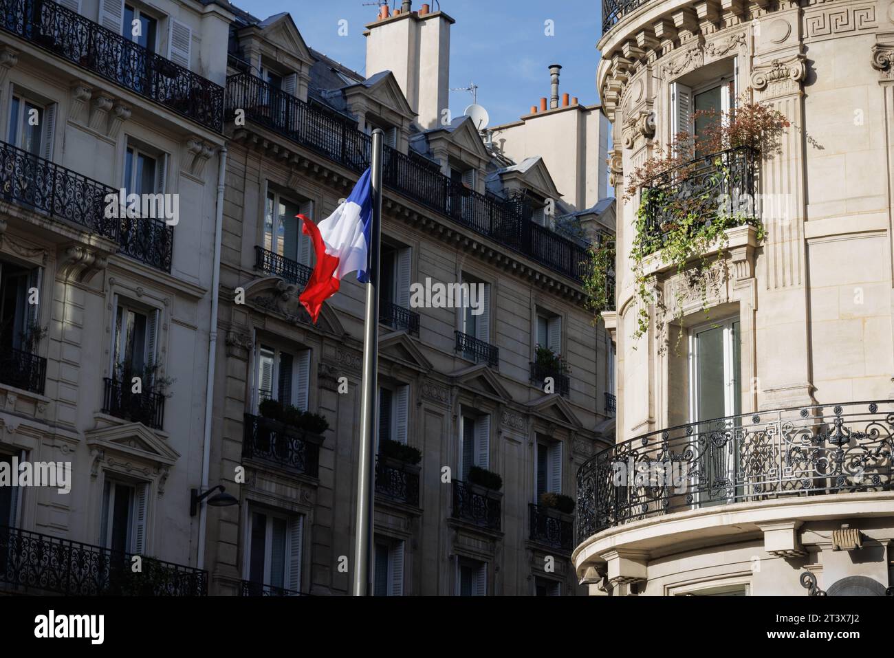 The French flag above the St Germain neighborhood of Paris, France