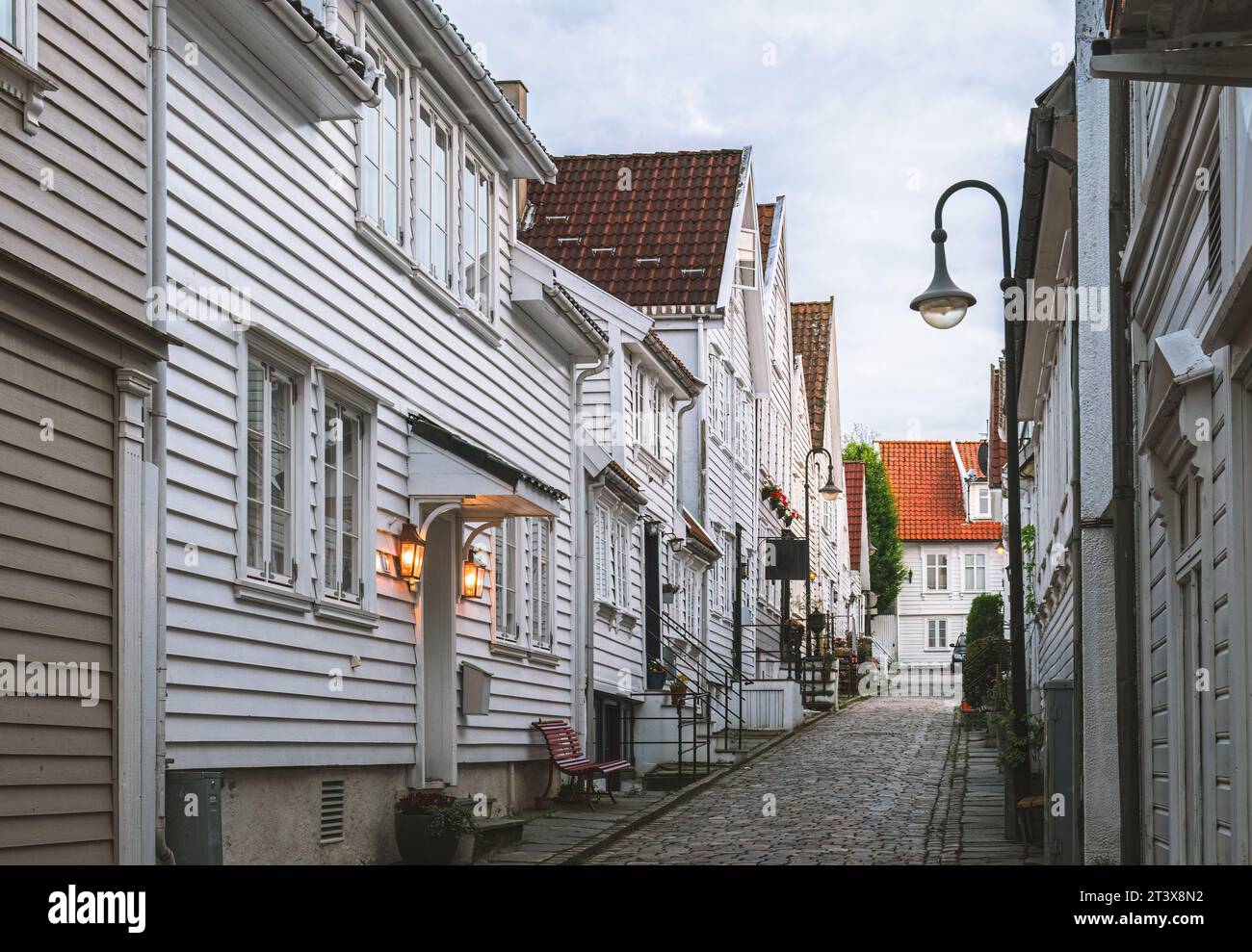 street with white houses of the old town of Stavanger in Norway Stock Photo