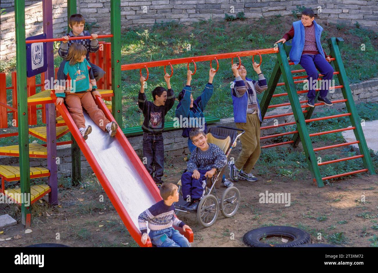Child wheelchair playground hi-res stock photography and images - Alamy