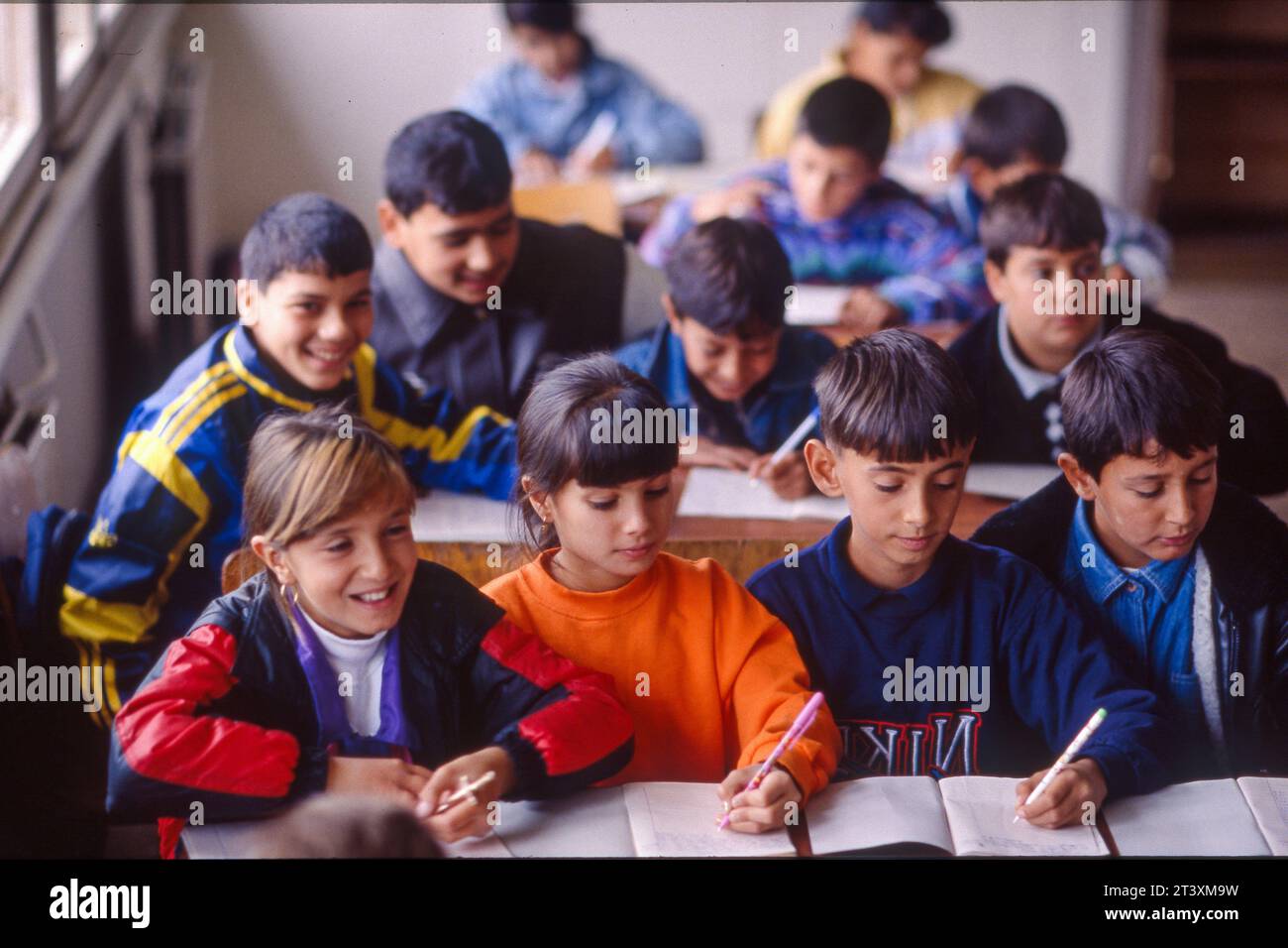 Bulgaria, Plovdiv. Girls and boys in class of primary school. Stock Photo