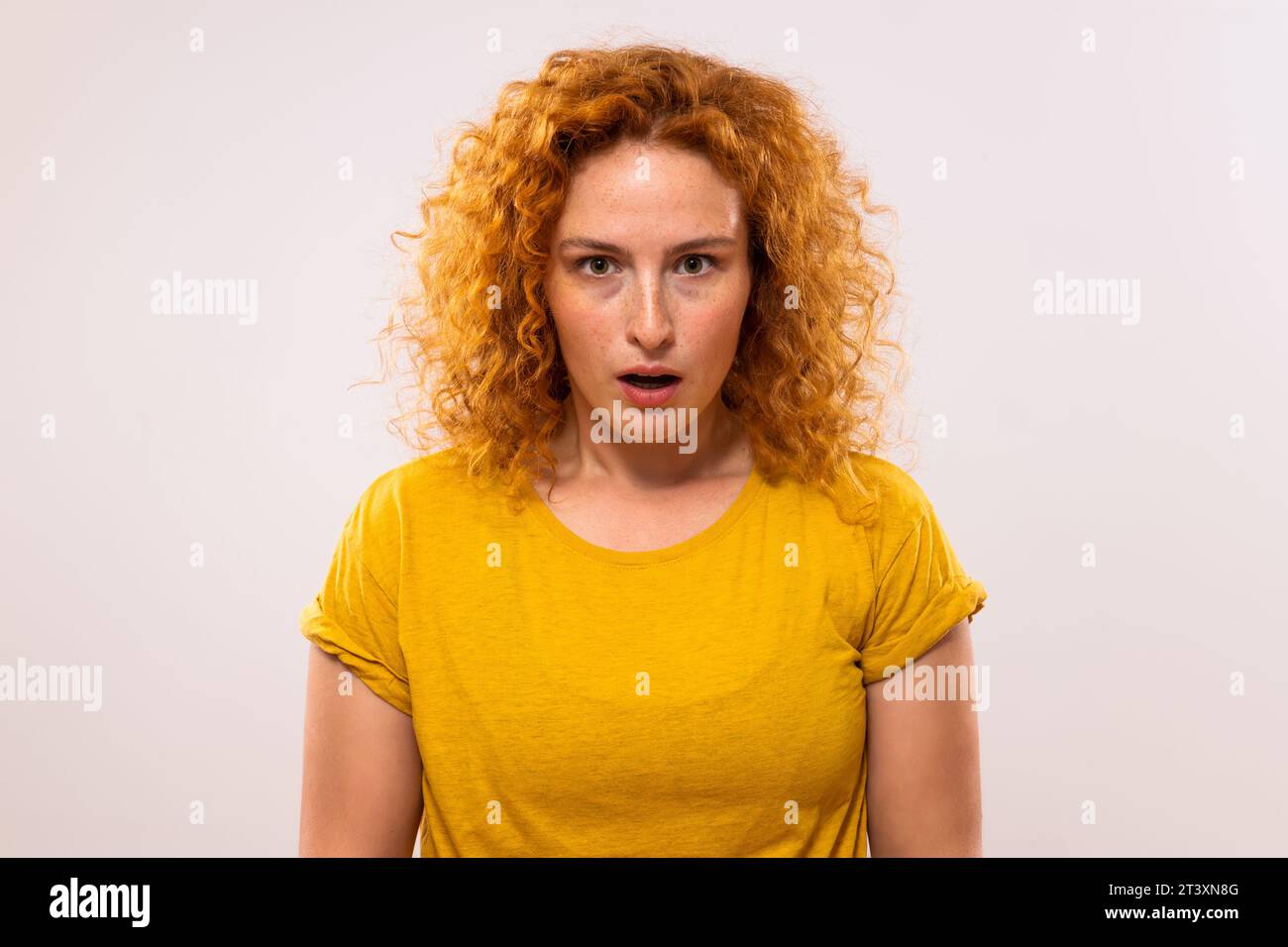 Shocked worried redhead woman hi-res stock photography and images - Alamy