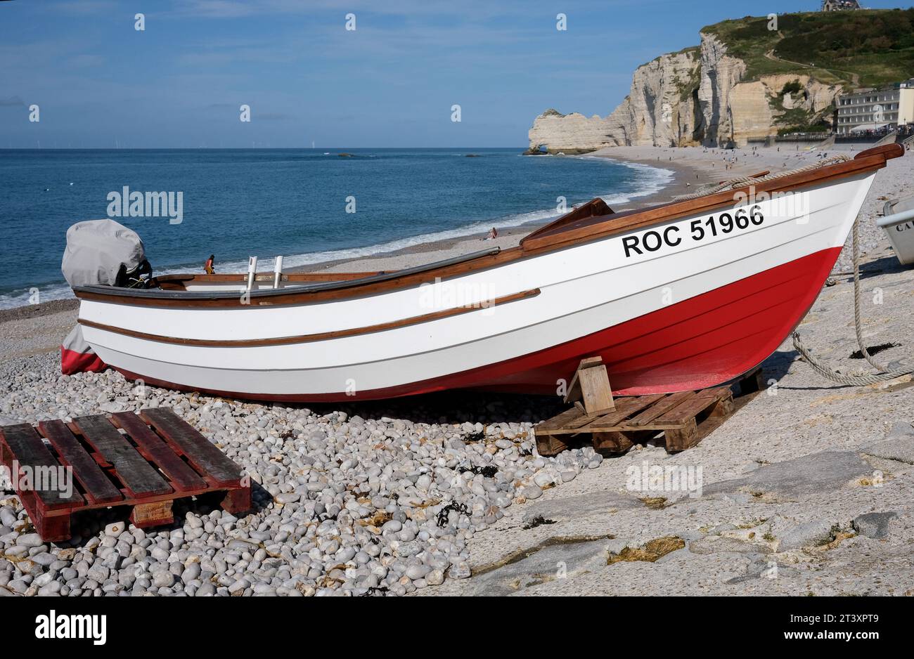Etretat beach with it's famous chalk cliffs and coastal rock formations ...