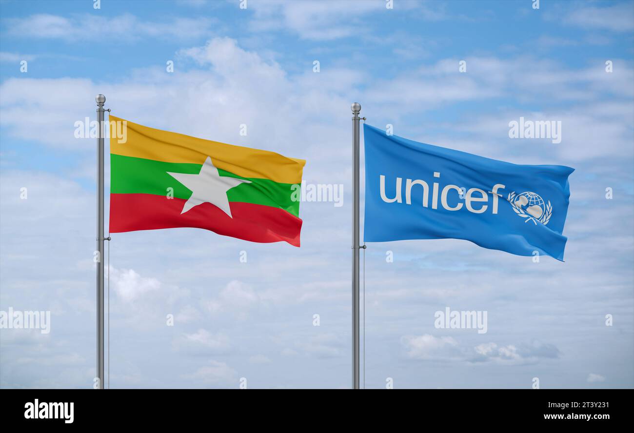UNICEF and Myanmar flags waving together in the wind on blue cloudy sky ...