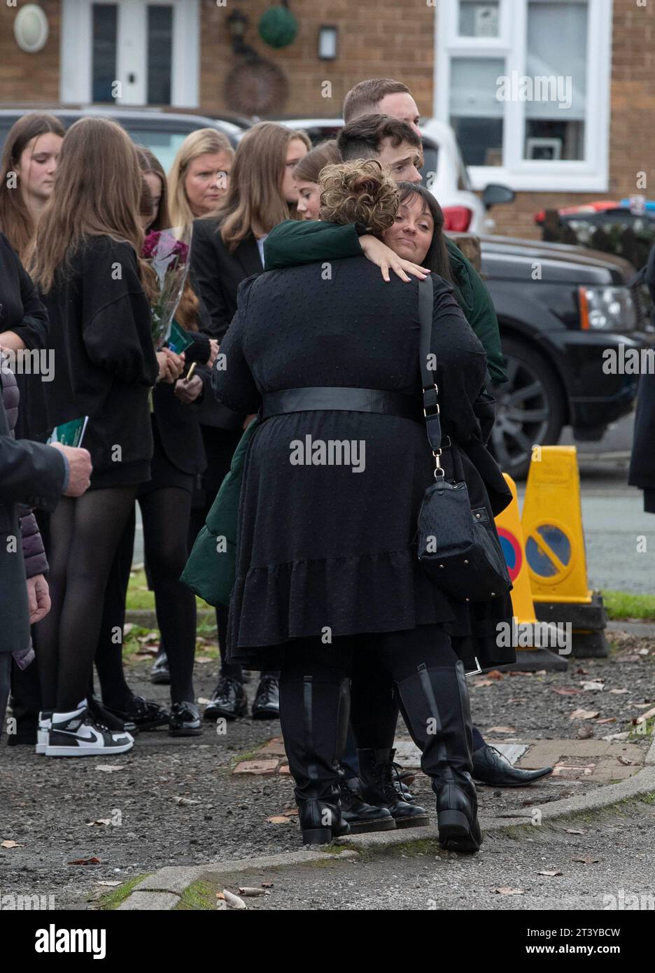Mourners outside St Theresa's Catholic Church, in Chester, after the