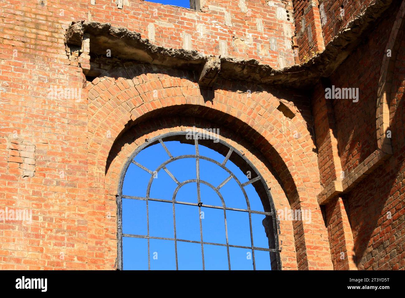 abandoned building under the blue sky in a factory Stock Photo - Alamy