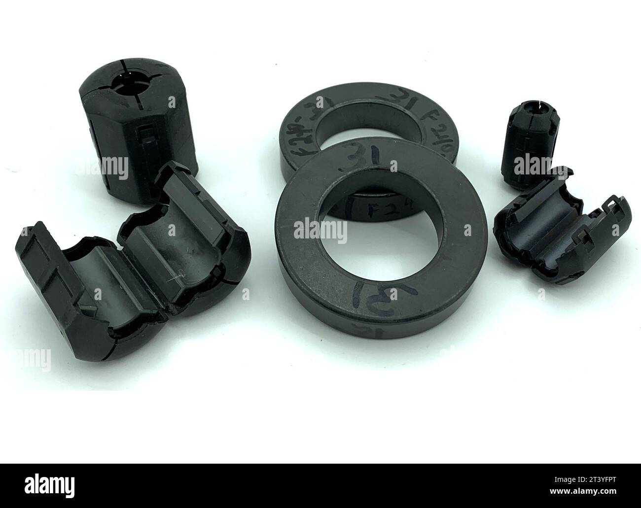 Ferrite snap on beads and toroid Stock Photo Alamy