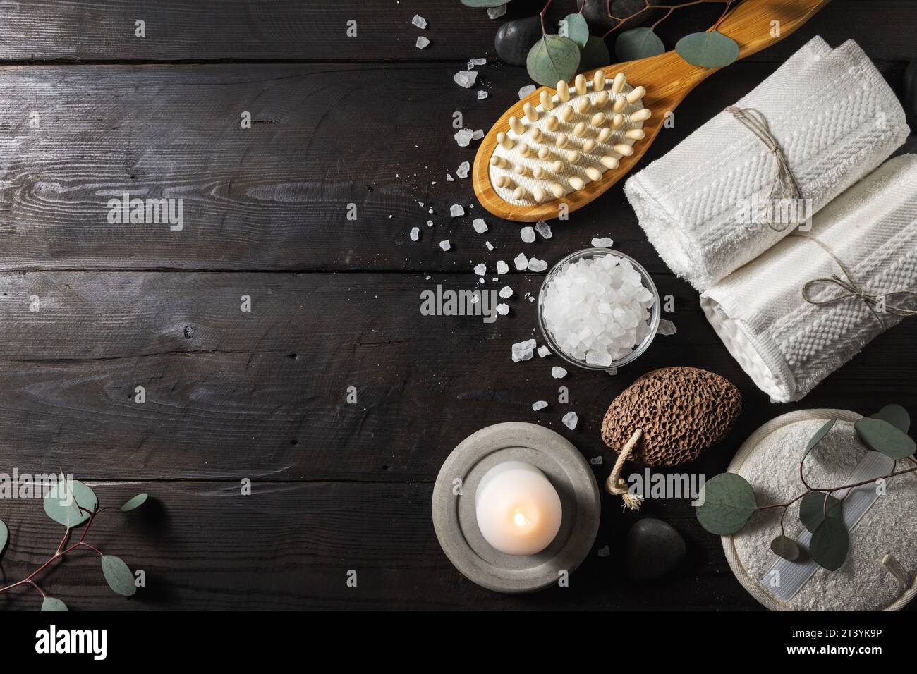 wellness spa treatment. body skin care items for bath procedures on dark wooden background. top view copy space Stock Photo