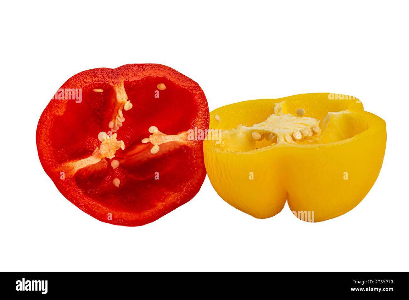 two halves of yellow and red pepper on white background Stock Photo - Alamy