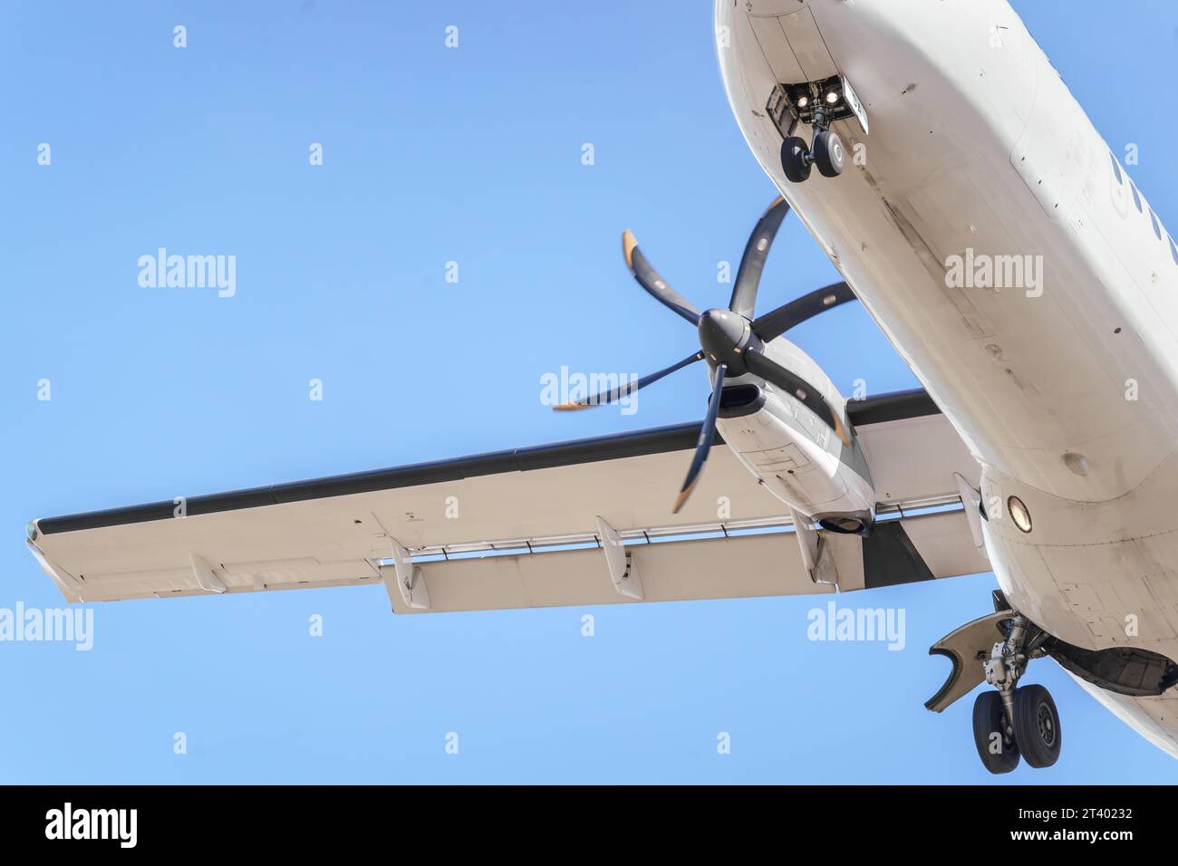 Details of an ATR 72 airplane, a twin-engine turboprop short-haul regional passenger aircraft. Landing airplane. Stock Photo